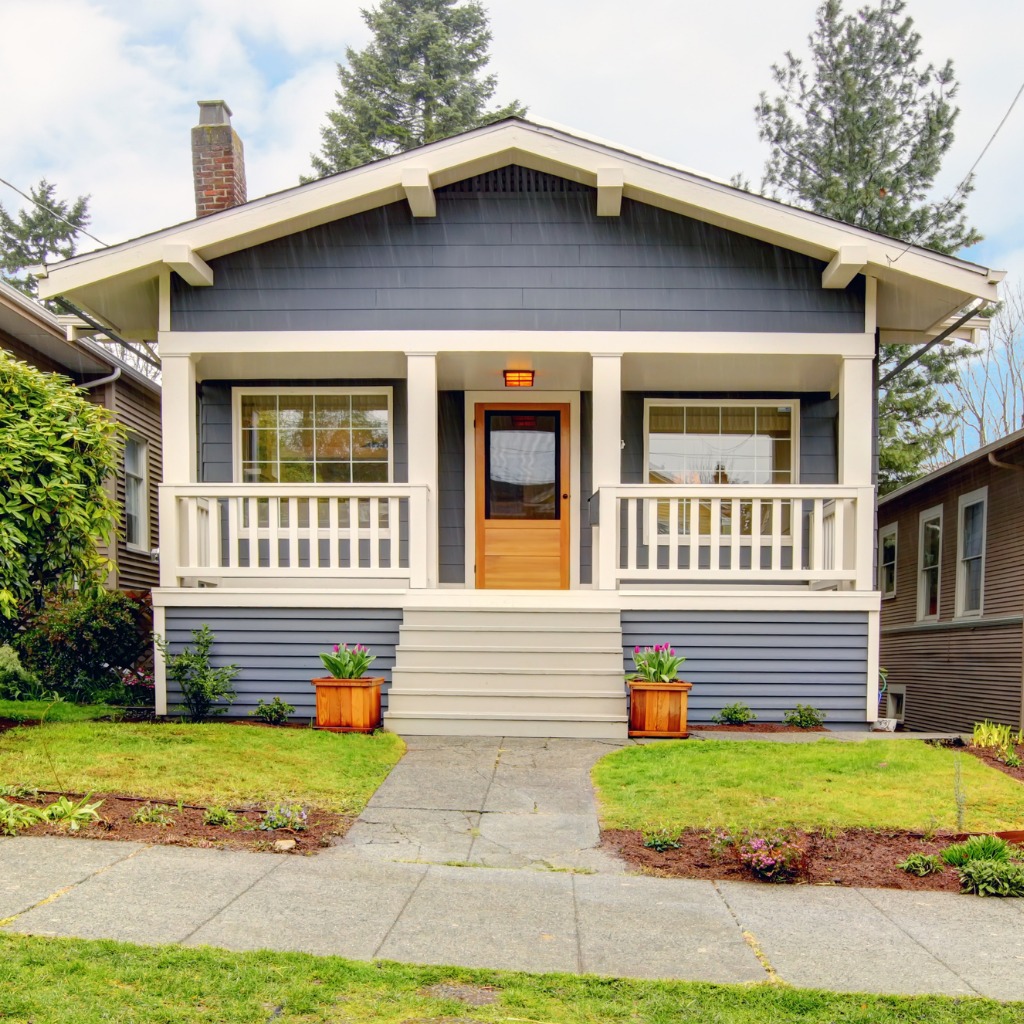 small-blue-house-with-white-porch-exterior